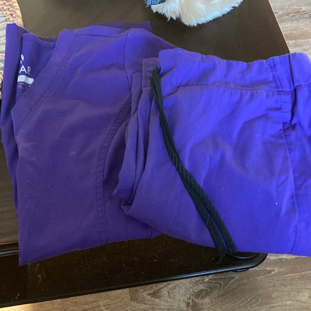 Two pairs of scrubs